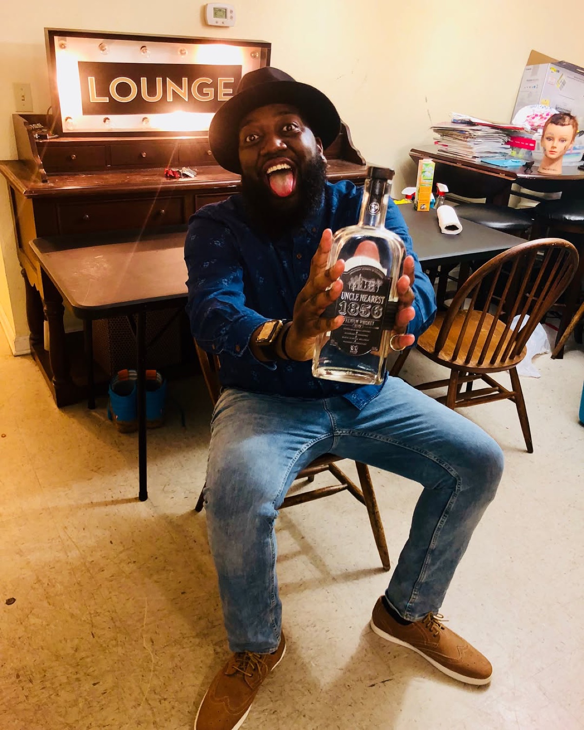 Joe Major with an Uncle Nearest 1856 bottle